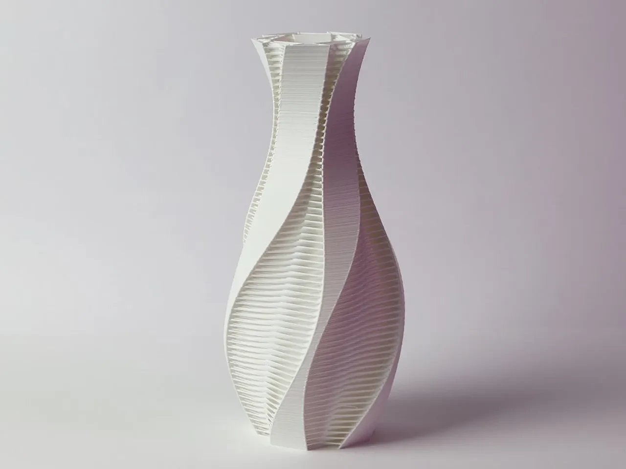 Twisted vase with strands